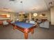 Spacious recreation room with a pool table, kitchenette, and comfortable seating offers a versatile space at 711 Cosmopolitan Ne Dr # 338, Atlanta, GA 30324