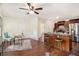 Modern kitchen featuring stainless steel appliances, an island with bar seating, and hardwood floors with dining space at 2070 Brannen Se Rd, Atlanta, GA 30316