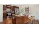 Open kitchen featuring stainless steel appliances, a breakfast bar, stylish backsplash, and a functional layout at 2070 Brannen Se Rd, Atlanta, GA 30316