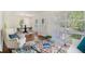 Inviting living area featuring hardwood floors, natural light, and comfortable seating and stylish decor at 2070 Brannen Se Rd, Atlanta, GA 30316
