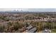 Aerial view showcasing the property within a verdant neighborhood and distant city skyline at 2323 Mason Dr # D21, Atlanta, GA 30316