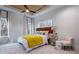 Bright bedroom with wooden ceiling, modern fan, large windows and comfy decor at 2323 Mason Dr # D21, Atlanta, GA 30316