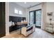 Bright breakfast nook with a built-in bench, wooden table, and access to a balcony at 2323 Mason Dr # D21, Atlanta, GA 30316