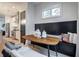 Open dining area showcasing bench seating and a view of the kitchen, perfect for entertaining at 2323 Mason Dr # D21, Atlanta, GA 30316