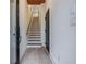 Bright entryway featuring wood floors, stairs to the next level, and neutral paint at 2323 Mason Dr # D21, Atlanta, GA 30316