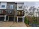 Contemporary townhome with sleek design, private balcony, and attached garage at 2323 Mason Dr # D21, Atlanta, GA 30316