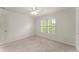 Inviting bedroom with plush carpeting and a bright window at 3049 Brightwood Se Ln, Marietta, GA 30067