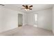 Spacious bedroom featuring neutral carpeting, ceiling fan, and a light and airy ambiance at 3049 Brightwood Se Ln, Marietta, GA 30067