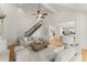 Open-concept living room featuring high ceilings, fireplace, and staircase with views to the kitchen and dining area at 3049 Brightwood Se Ln, Marietta, GA 30067
