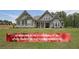 Charming two-story home with an acre of level yard and craftsman-style details at 485 Discovery Lake Dr, Fayetteville, GA 30215