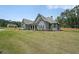 Charming home featuring a spacious yard and inviting front porch at 485 Discovery Lake Dr, Fayetteville, GA 30215
