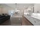 Open kitchen with granite countertops, large island, and modern appliances at 485 Discovery Lake Dr, Fayetteville, GA 30215