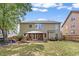 Private backyard with a covered patio, perfect for outdoor entertaining at 5415 Fieldfreen Dr, Cumming, GA 30028