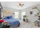 Cozy bedroom with ample natural light and stylish decor at 5415 Fieldfreen Dr, Cumming, GA 30028