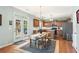 Updated kitchen, conveniently connected to the dining area and patio, with ample cabinetry and modern appliances at 5415 Fieldfreen Dr, Cumming, GA 30028
