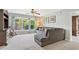 Large living area with ample seating and large windows bringing the outside in at 5415 Fieldfreen Dr, Cumming, GA 30028