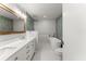 Modern bathroom featuring a dual sink vanity, soaking tub, and separate shower at 5902 Wills Orchard Rd, Cumming, GA 30040
