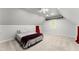 Spacious bedroom with carpet, sloped ceilings, and a bright window at 5902 Wills Orchard Rd, Cumming, GA 30040