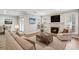 Staged living room featuring wood floors, fireplace and comfortable seating at 6806 Glenridge Dr # E, Atlanta, GA 30328