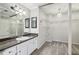 Primary bathroom with granite countertops, sink, and closet space at 6806 Glenridge Dr # E, Atlanta, GA 30328