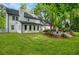 Backyard with a spacious green lawn and patio at 1384 Independence Way, Marietta, GA 30062