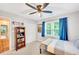 Comfortable bedroom with ceiling fan, natural light, closet, and hardwood floors at 1384 Independence Way, Marietta, GA 30062