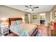 Comfortable bedroom with a ceiling fan, natural light, a decorative rug and stylish furnishings at 1384 Independence Way, Marietta, GA 30062