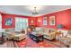 Living room with hardwood floors, plantation shutters, and comfortable seating for cozy gatherings at 1384 Independence Way, Marietta, GA 30062