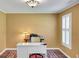 Cozy office space with ample natural light from shuttered window, perfect for a home workspace at 1384 Independence Way, Marietta, GA 30062