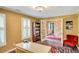 Bright office with a cozy reading nook and ample desk space, ideal for work and relaxation at 1384 Independence Way, Marietta, GA 30062