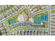 Aerial view of the community amenities including the pool, tennis courts, parking, and manicured landscaping at 169 Hickory Bluffs Pkwy, Canton, GA 30114
