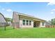 Expansive backyard with a covered patio, offering a private outdoor space at 169 Hickory Bluffs Pkwy, Canton, GA 30114