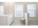 Bathroom featuring single vanity, stool, window and stand-up glass shower at 169 Hickory Bluffs Pkwy, Canton, GA 30114