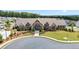 Beautiful community clubhouse with stone accents and manicured landscaping at 169 Hickory Bluffs Pkwy, Canton, GA 30114
