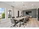 Conference room featuring a large table, modern chairs, and a wall-mounted TV, perfect for meetings and presentations at 169 Hickory Bluffs Pkwy, Canton, GA 30114