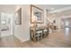 Stylish entryway with light hardwood floors and a decorative console table, creating a welcoming first impression at 169 Hickory Bluffs Pkwy, Canton, GA 30114
