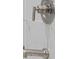 Close-up on shower faucet with tiled marble wall at 169 Hickory Bluffs Pkwy, Canton, GA 30114