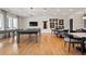 Spacious game room with a pool table, tables and chairs, ideal for entertainment and recreation at 169 Hickory Bluffs Pkwy, Canton, GA 30114