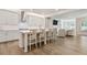 Bright, open kitchen features a large island with seating and an open view to the living room at 169 Hickory Bluffs Pkwy, Canton, GA 30114