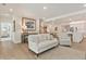 Open-concept living room and kitchen featuring neutral decor and wood flooring at 169 Hickory Bluffs Pkwy, Canton, GA 30114