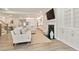 Bright living room features fireplace, built-ins and open floor plan into the kitchen at 169 Hickory Bluffs Pkwy, Canton, GA 30114