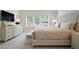 Inviting main bedroom with ample natural light, neutral tones and clean lines creates a comfortable space at 169 Hickory Bluffs Pkwy, Canton, GA 30114