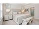 Bright main bedroom features large windows, neutral palette and stylish décor at 169 Hickory Bluffs Pkwy, Canton, GA 30114