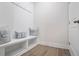A well-designed mudroom with storage and a bench, great for organization at 169 Hickory Bluffs Pkwy, Canton, GA 30114