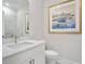 Elegant powder room featuring marble accents, modern fixtures, and stylish decor, offering a luxurious and convenient space at 169 Hickory Bluffs Pkwy, Canton, GA 30114