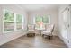 Sun Room with two chairs, table, large windows offering views of fenced yard at 169 Hickory Bluffs Pkwy, Canton, GA 30114