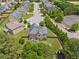 Aerial view of a home showcasing a well manicured backyard with great landscaping at 2430 Tack Hill Ct, Dacula, GA 30019