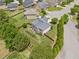 Aerial view of a home showcasing a well manicured backyard with great landscaping at 2430 Tack Hill Ct, Dacula, GA 30019