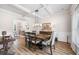 Bright dining room with wood floors, coffered ceilings, and traditional decor at 2430 Tack Hill Ct, Dacula, GA 30019