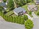 Beautiful two-story home with a well-maintained lawn, mature trees, and a fenced backyard at 2430 Tack Hill Ct, Dacula, GA 30019